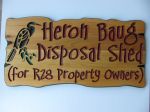 Engraved wood sign heron
